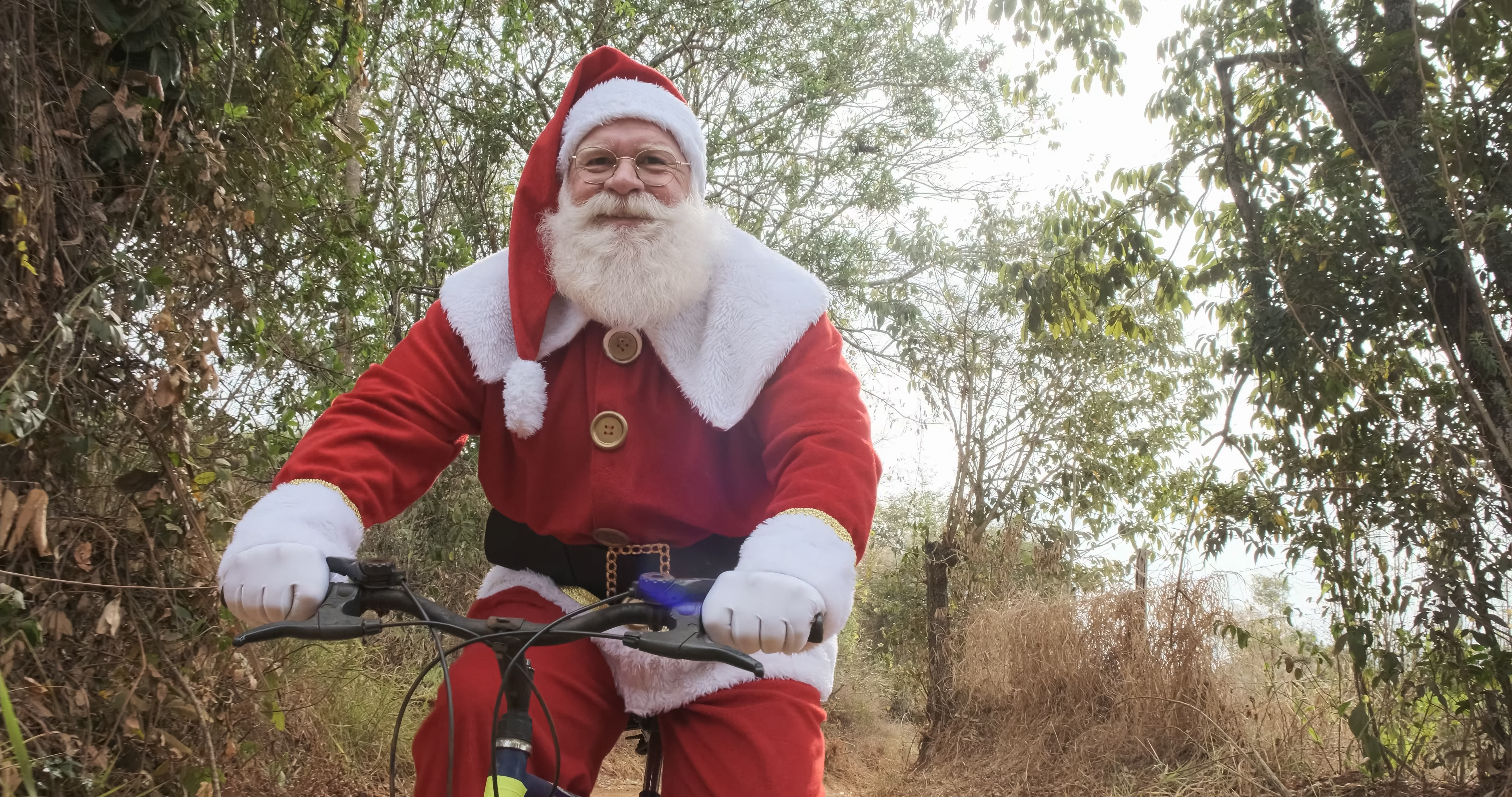 Father Christmas on a bike