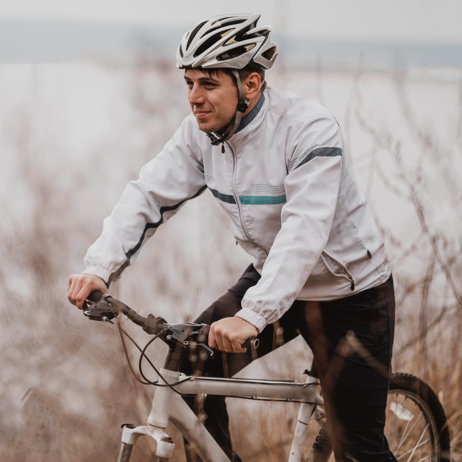 Man on bike in winter